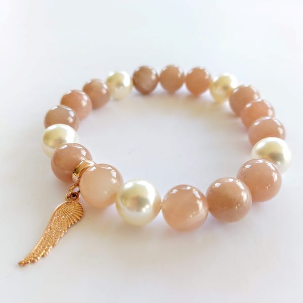 Saules akmens un apzeltīta sudraba aproce